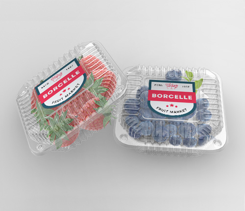 clamshell containers with fruit and labels